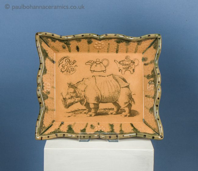 "Rhino in a China dish". Oblong dish with Rococo rim. Underglaze prints including Albrecht Durer's rhino. My first oblong dish. Inside, on plinth.