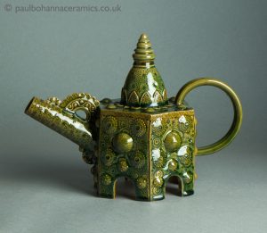 Hexagonal teapot. Green lead glazed with oxides. PB050. Obverse.
