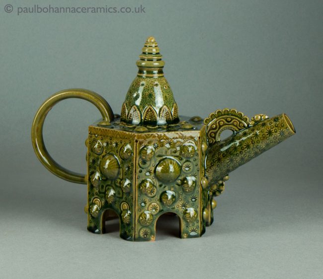 Hexagonal teapot. Green lead glazed with oxides. PB050. Reverse.