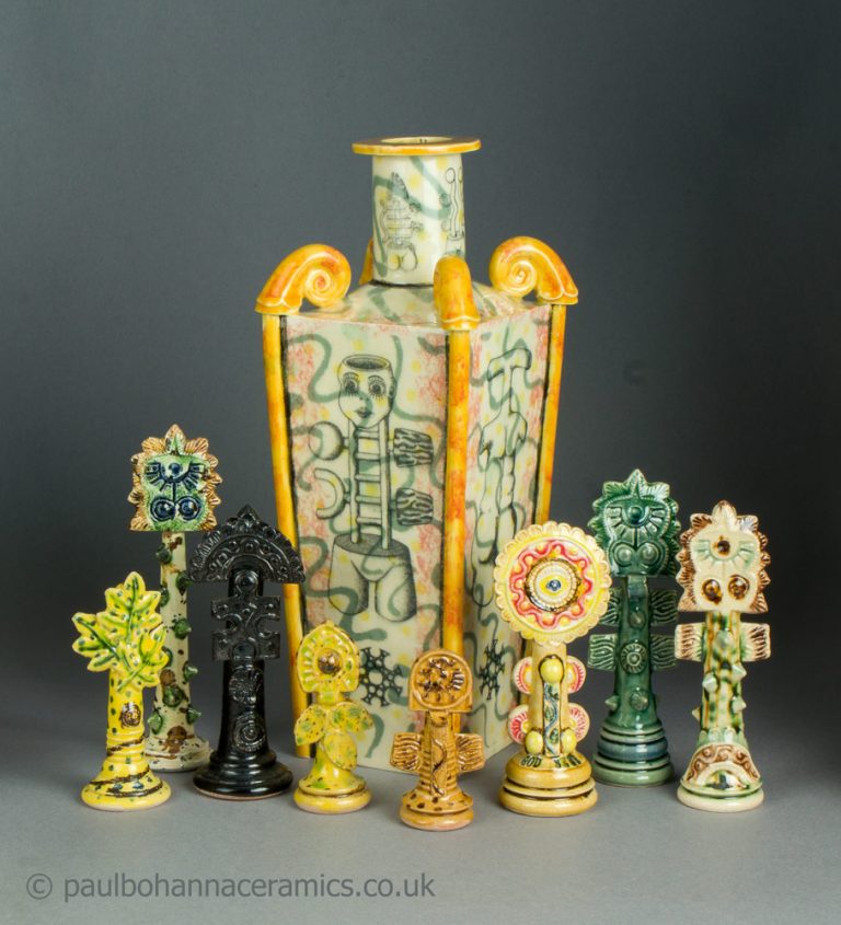 Paul Bohanna ceramics. Group of 'ghosts' with bottle vase.